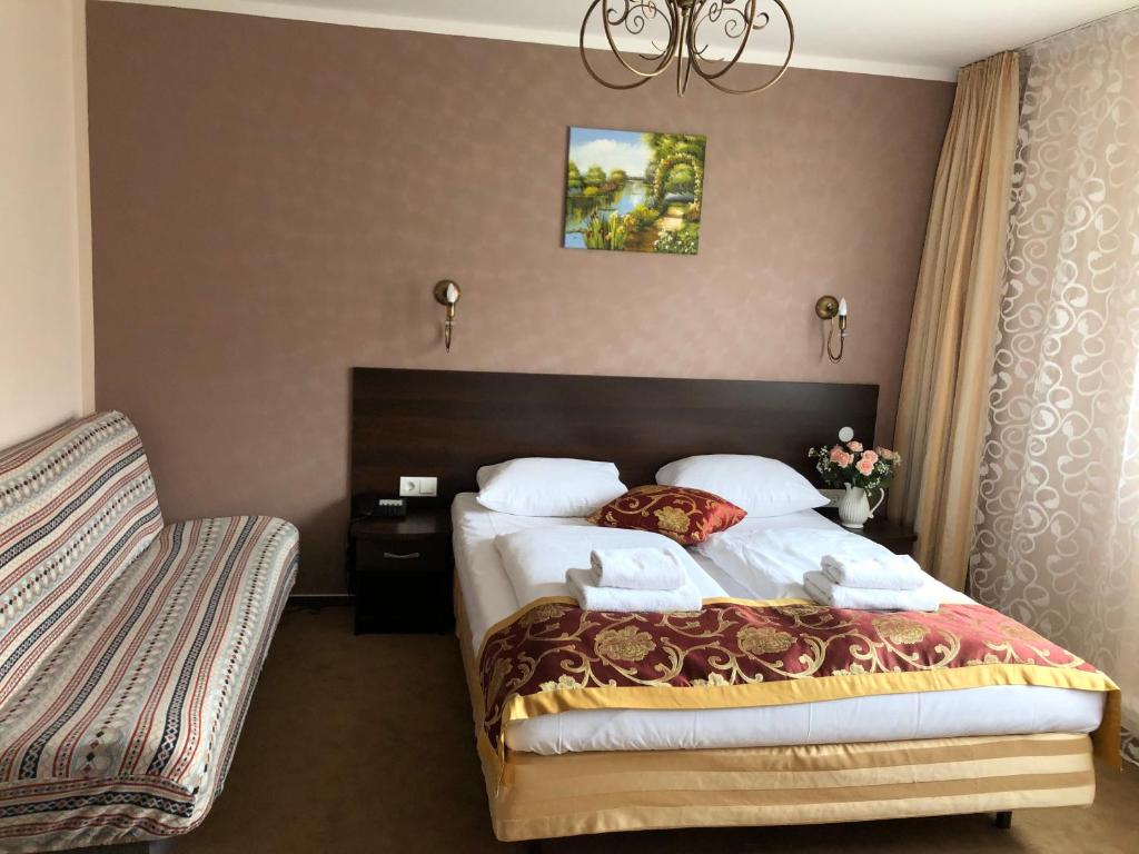 Postel nebo postele na pokoji v ubytování Atlas Berlin Hotel