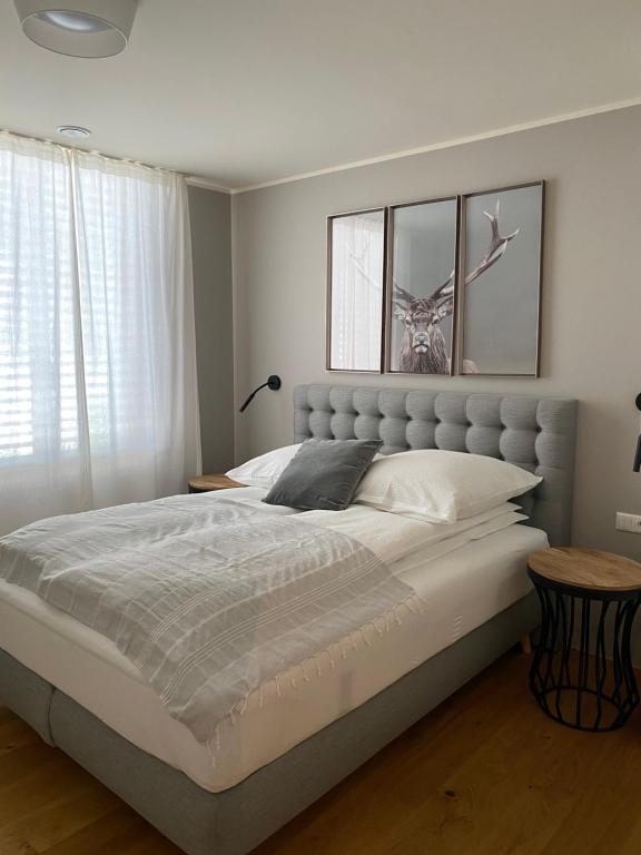 Кровать или кровати в номере Das Stadthouse