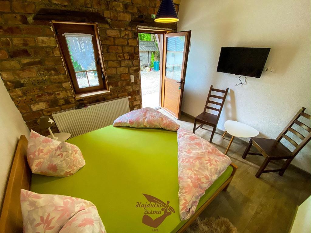 Postel nebo postele na pokoji v ubytování Holiday park Hajducka cesma