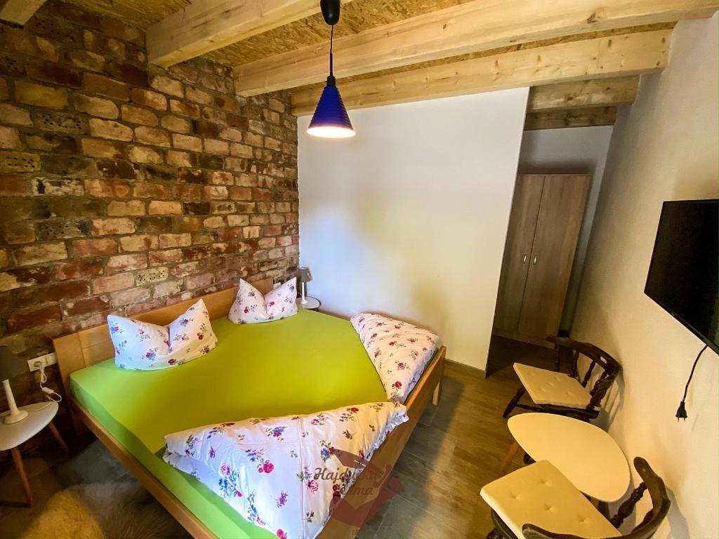 Postel nebo postele na pokoji v ubytování Holiday park Hajducka cesma