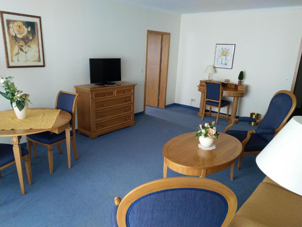 TV a/nebo společenská místnost v ubytování Hotel Fortuna