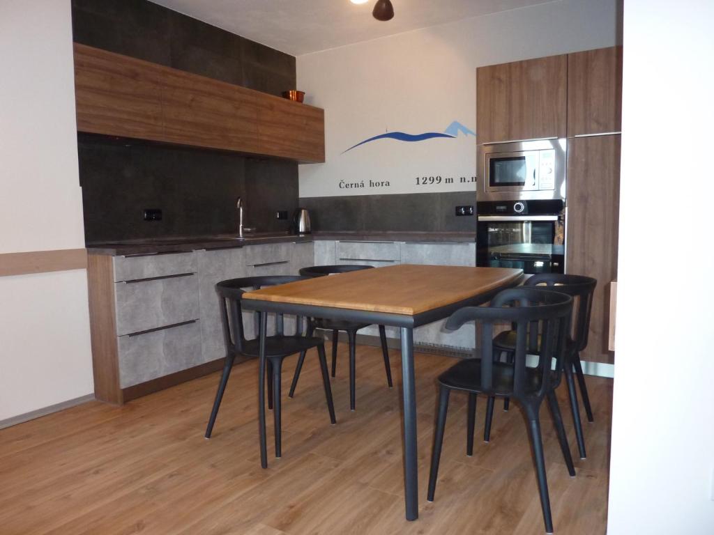 Kuchyň nebo kuchyňský kout v ubytování Apartmán 18 - Jestřáb