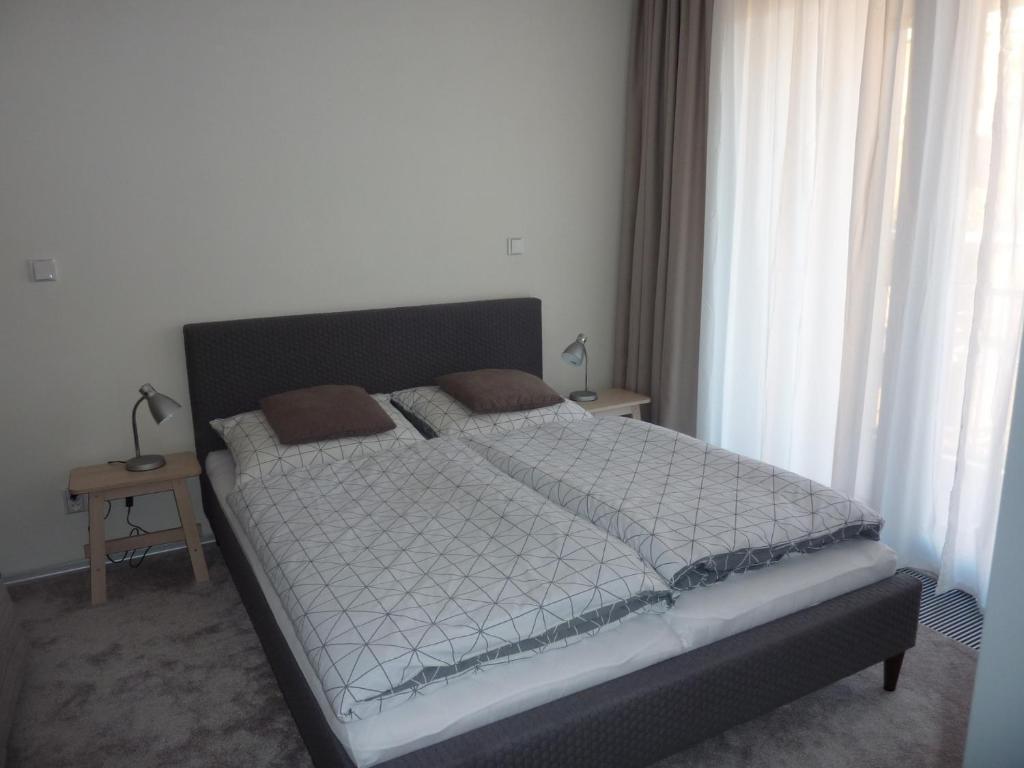 Postel nebo postele na pokoji v ubytování Apartmán 18 - Jestřáb