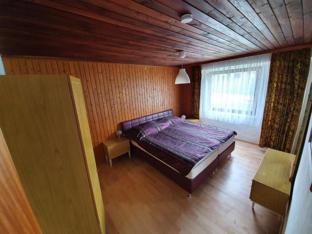 Postel nebo postele na pokoji v ubytování Appartements Amrusch