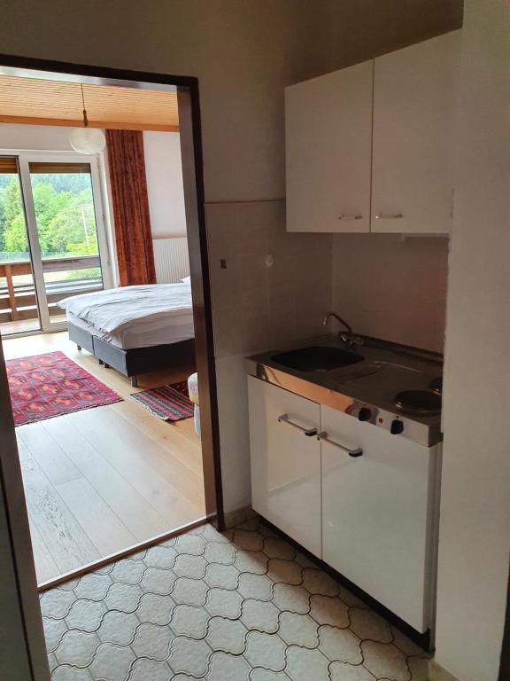 Kuchyň nebo kuchyňský kout v ubytování Appartements Amrusch