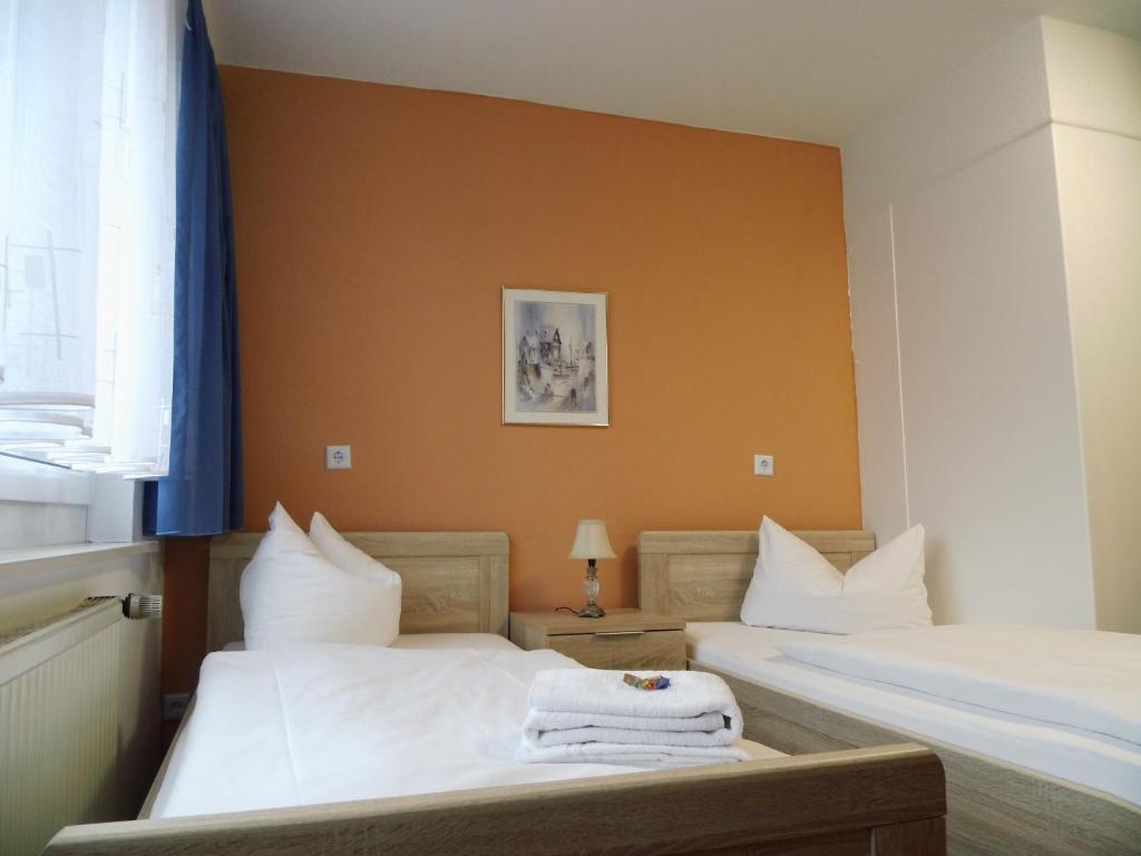 Postel nebo postele na pokoji v ubytování Hotel Sturm