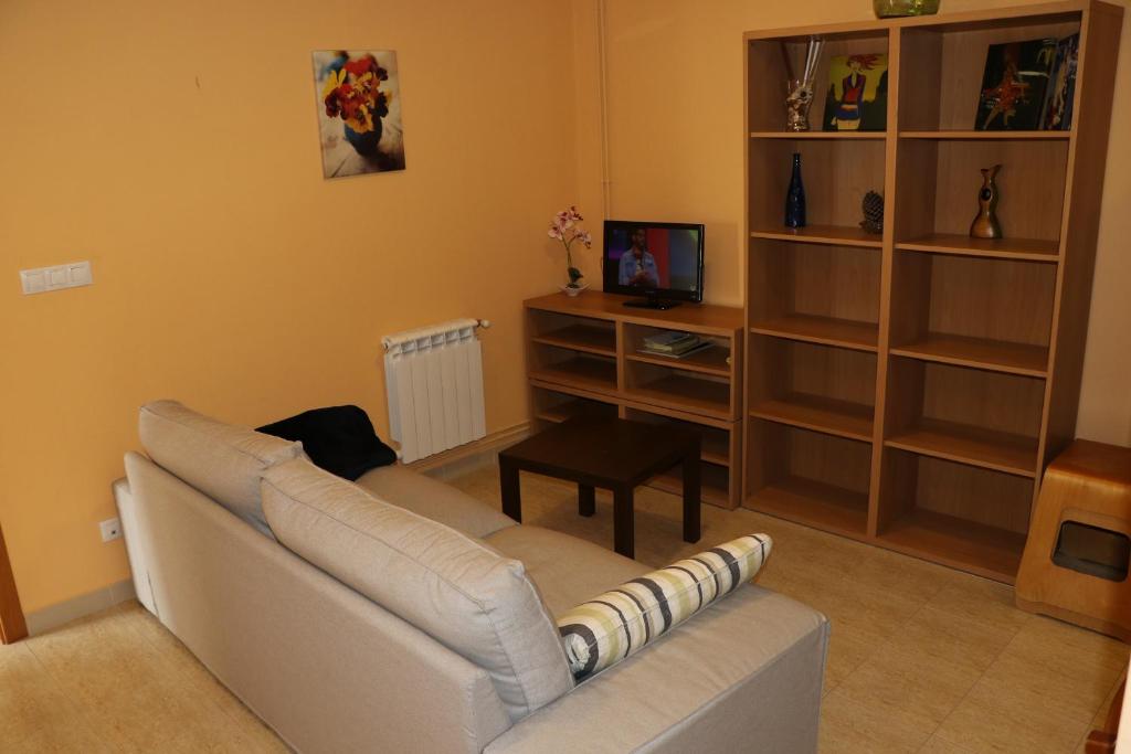 TV a/nebo společenská místnost v ubytování Apartamentos Lidia