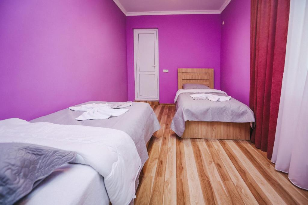 Postel nebo postele na pokoji v ubytování Bebo Babu Guest House