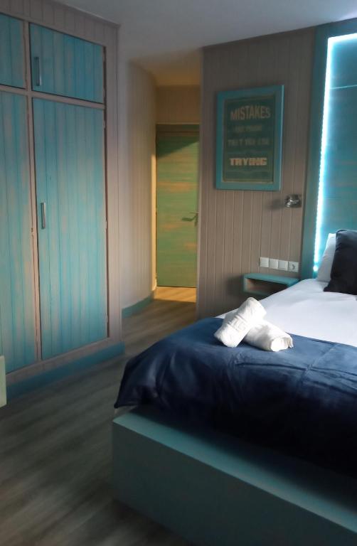 Postel nebo postele na pokoji v ubytování Villa Palma