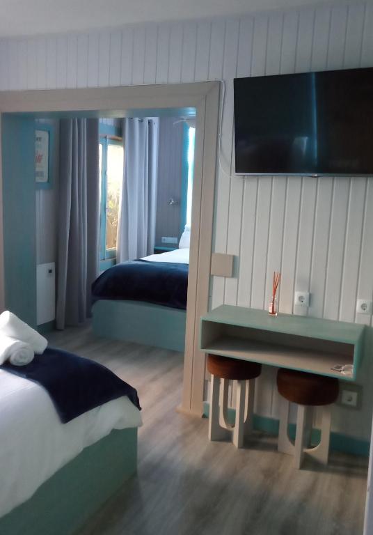 Postel nebo postele na pokoji v ubytování Villa Palma