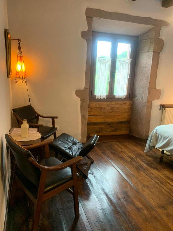 Postel nebo postele na pokoji v ubytování Posada de Ziga