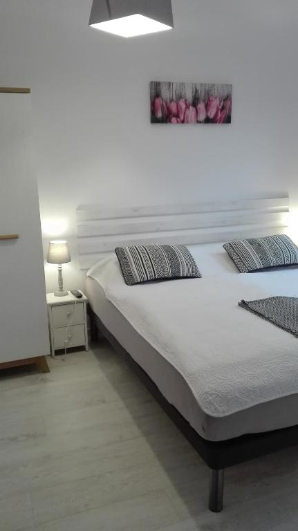 Posteľ alebo postele v izbe v ubytovaní Mizerówka Guest House