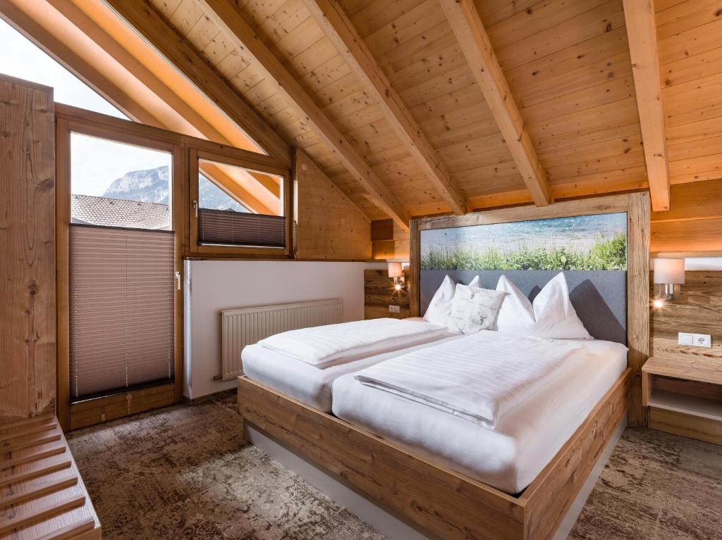 Ένα ή περισσότερα κρεβάτια σε δωμάτιο στο Hotel Gänsleit