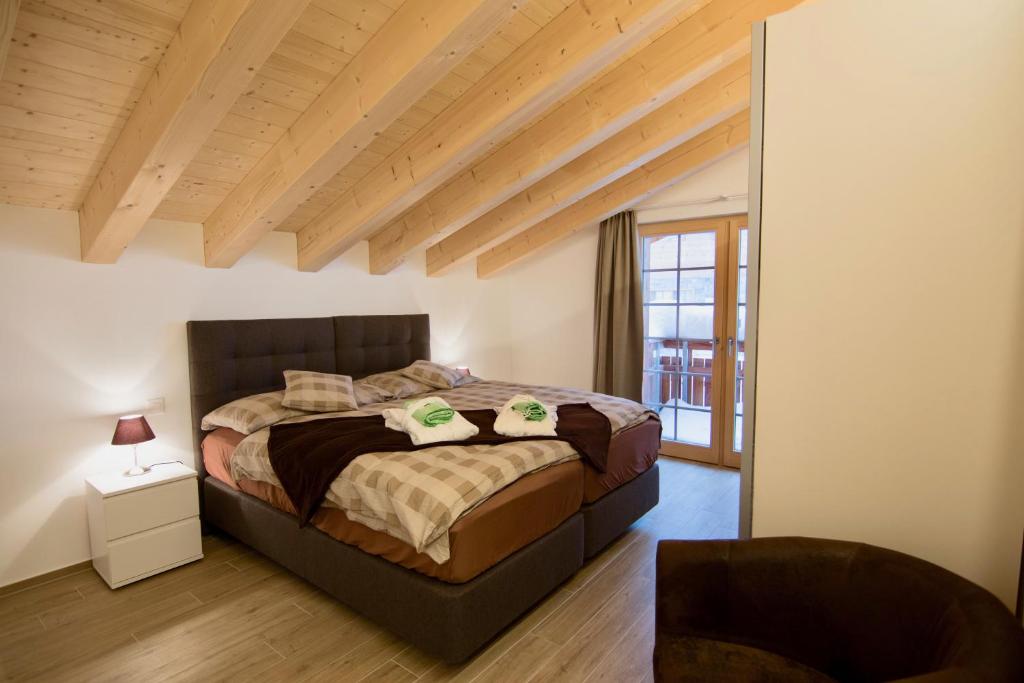 Postel nebo postele na pokoji v ubytování Element Chalets Zermatt