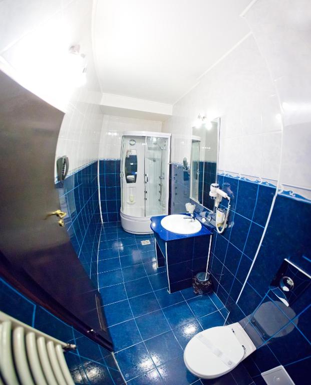 Koupelna v ubytování Hotel Piemonte