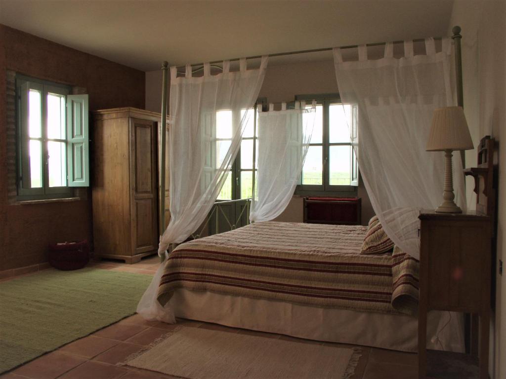 מיטה או מיטות בחדר ב-Hotel Boutique Moli El Canyisset