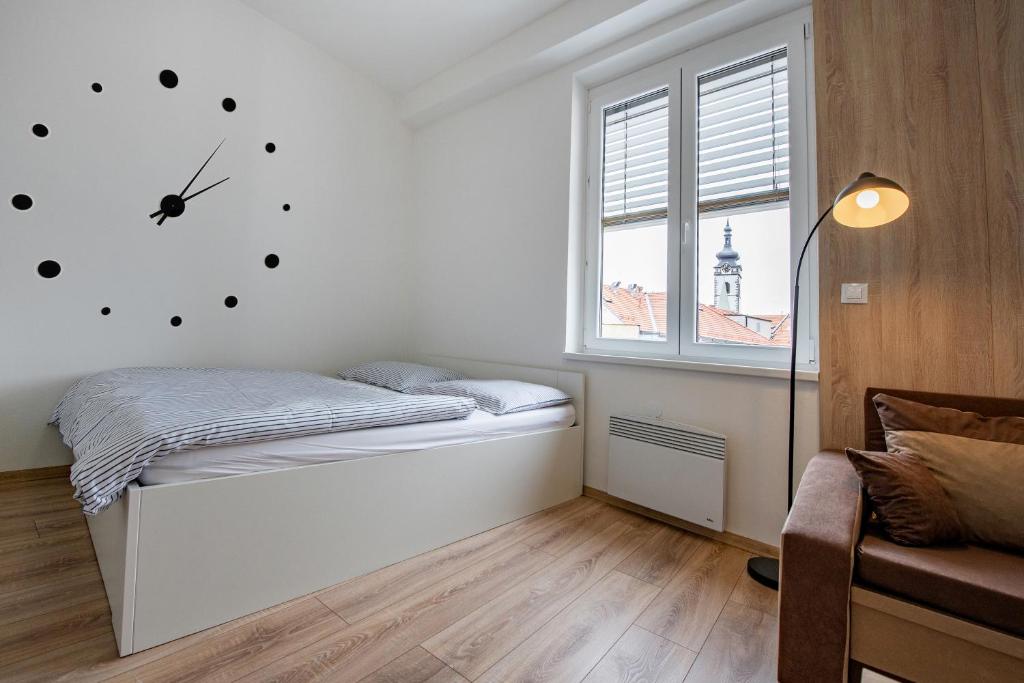 Postel nebo postele na pokoji v ubytování Soho apartment