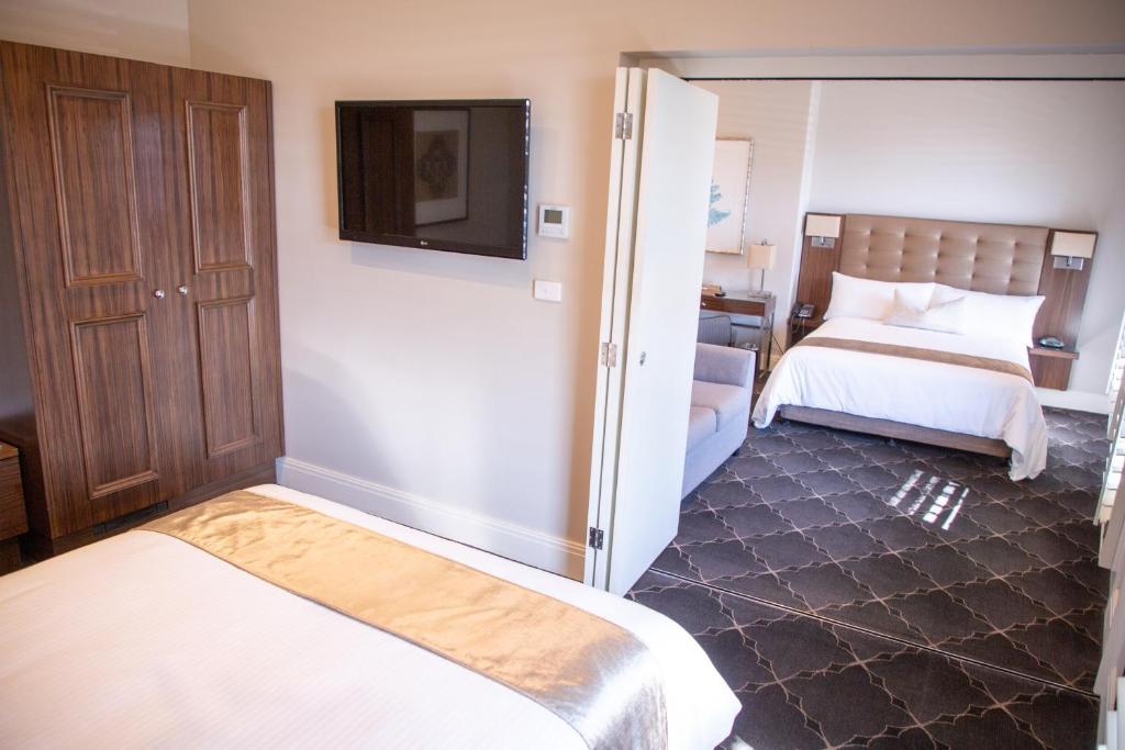 Postel nebo postele na pokoji v ubytování Royal Hotel Randwick