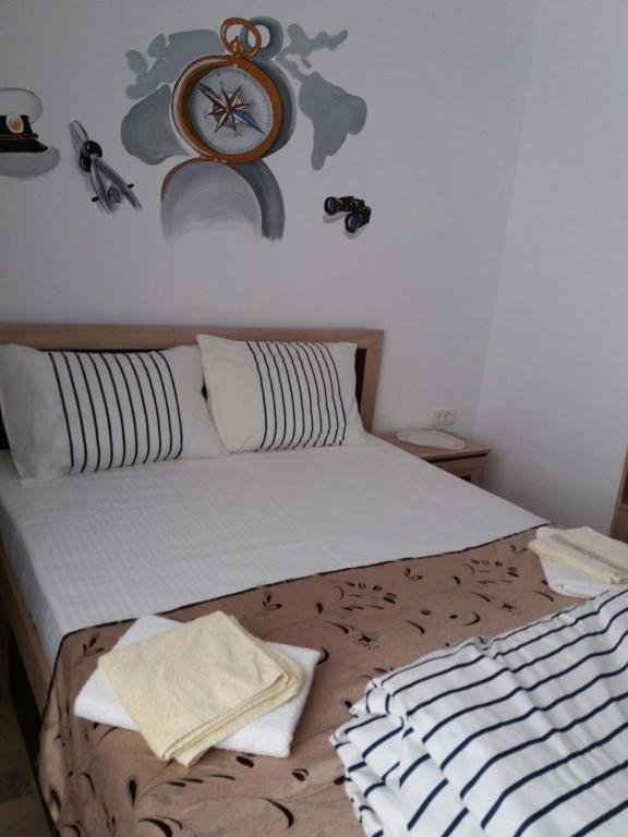 Postel nebo postele na pokoji v ubytování EL Capitano - Mamaia Nord