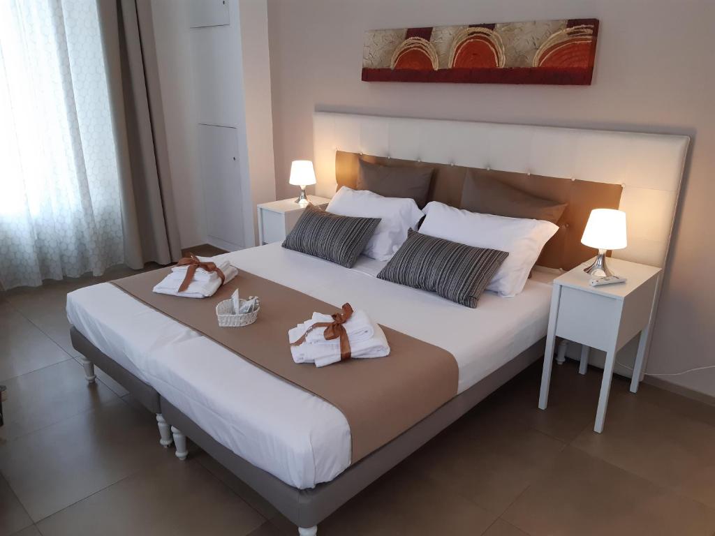 Ένα ή περισσότερα κρεβάτια σε δωμάτιο στο Visitazione Holiday Sassi Suite