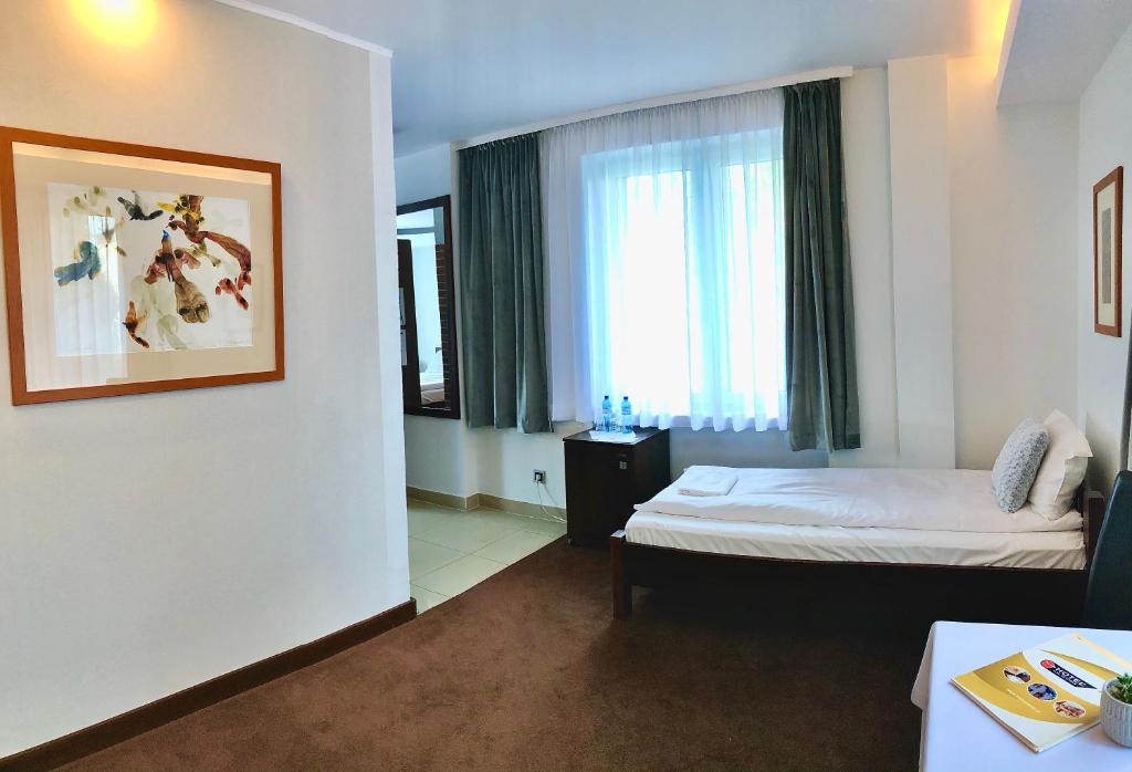 Кровать или кровати в номере Hotel Olecki