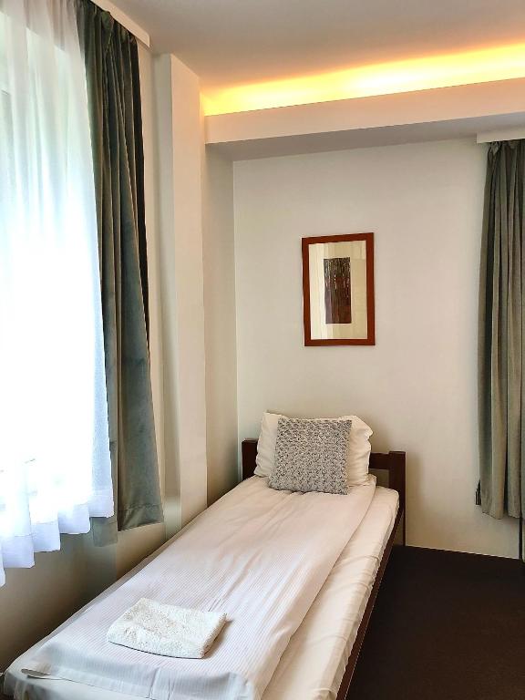 Кровать или кровати в номере Hotel Olecki