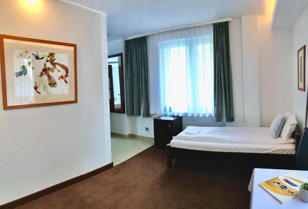 Кровать или кровати в номере Hotel Olecki