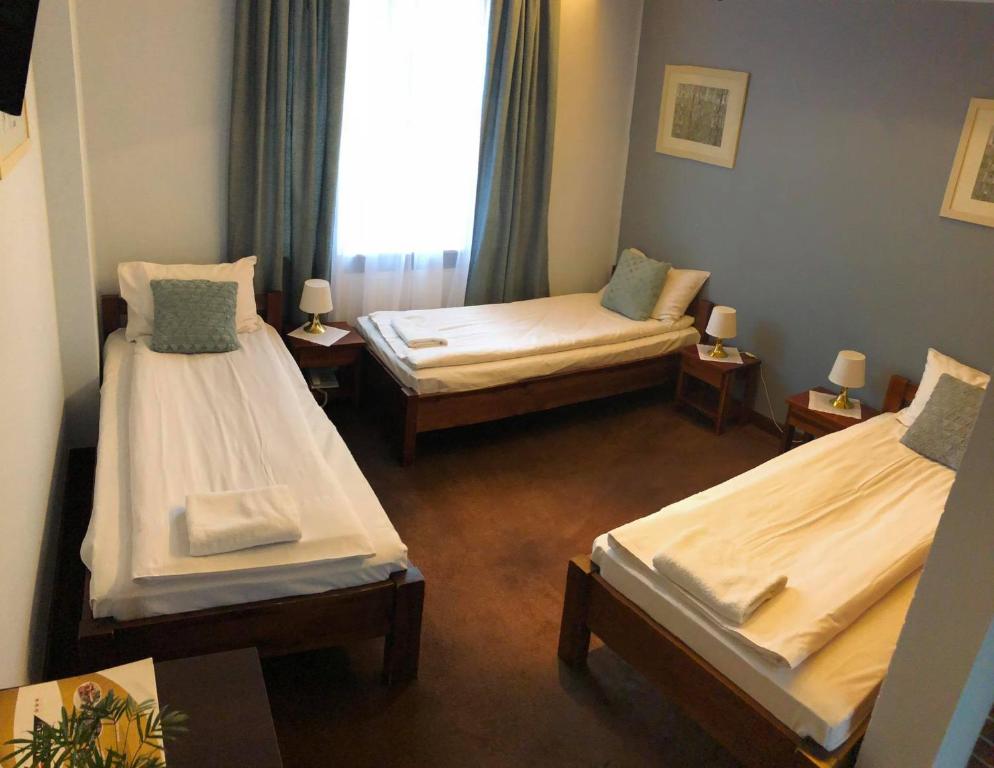 Кровать или кровати в номере Hotel Olecki