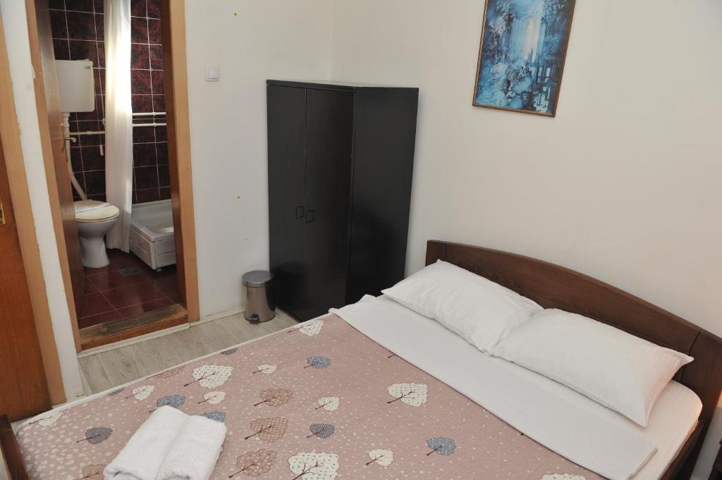 Postel nebo postele na pokoji v ubytování Bulevar