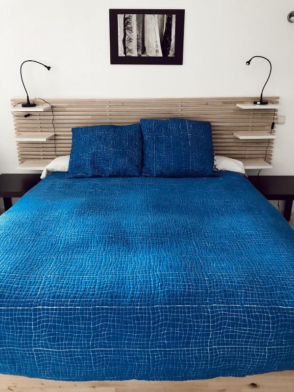 Posteľ alebo postele v izbe v ubytovaní Apartamentos Chinasolymar
