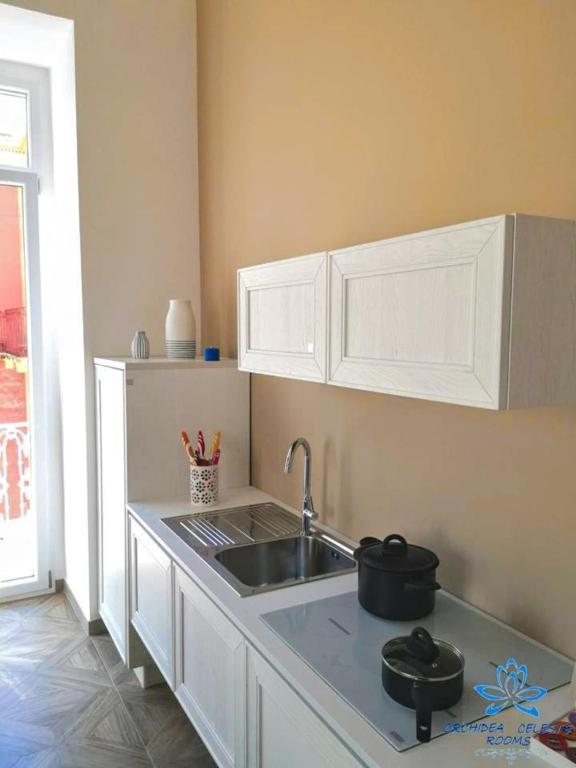 Kuchyň nebo kuchyňský kout v ubytování B&B Orchidea Celeste