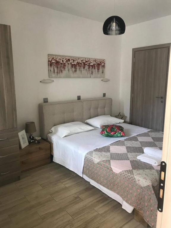 Postel nebo postele na pokoji v ubytování Chrysanthi studios and apartments Pefkos