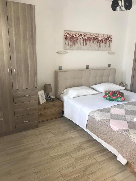 Postel nebo postele na pokoji v ubytování Chrysanthi studios and apartments Pefkos