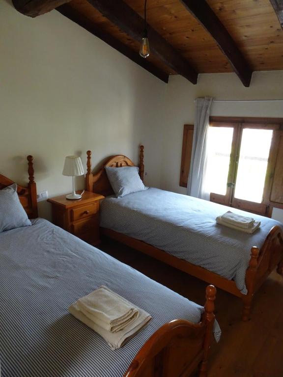 Llit o llits en una habitació de Les Magranes Bed & Breakfast