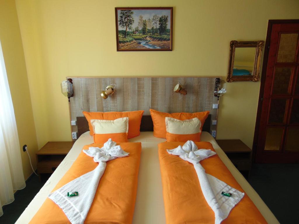 Posteľ alebo postele v izbe v ubytovaní Thomas Apartman Eger