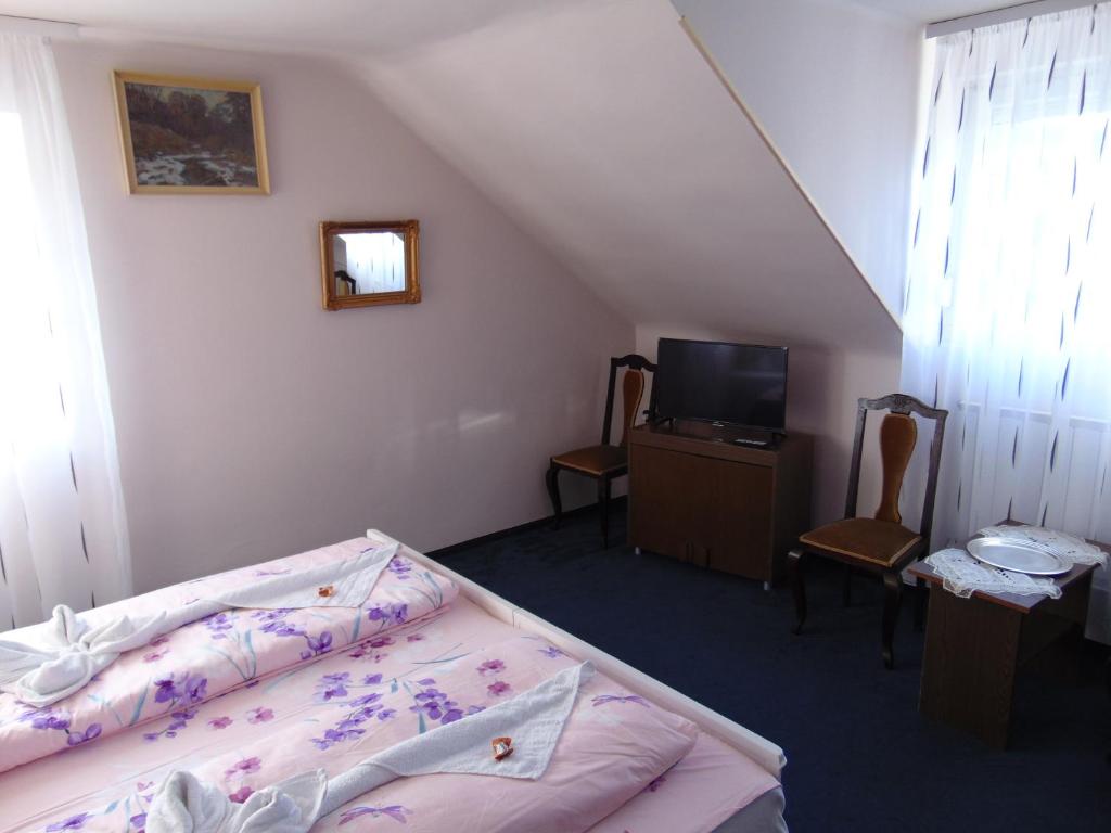 Posteľ alebo postele v izbe v ubytovaní Thomas Apartman Eger