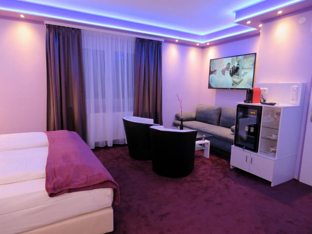 TV a/nebo společenská místnost v ubytování Hotel Residenz Hössinger