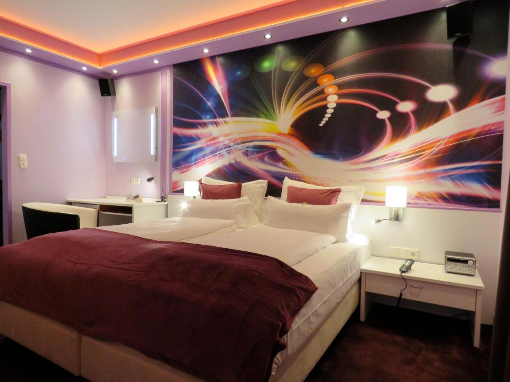 Postel nebo postele na pokoji v ubytování Hotel Residenz Hössinger
