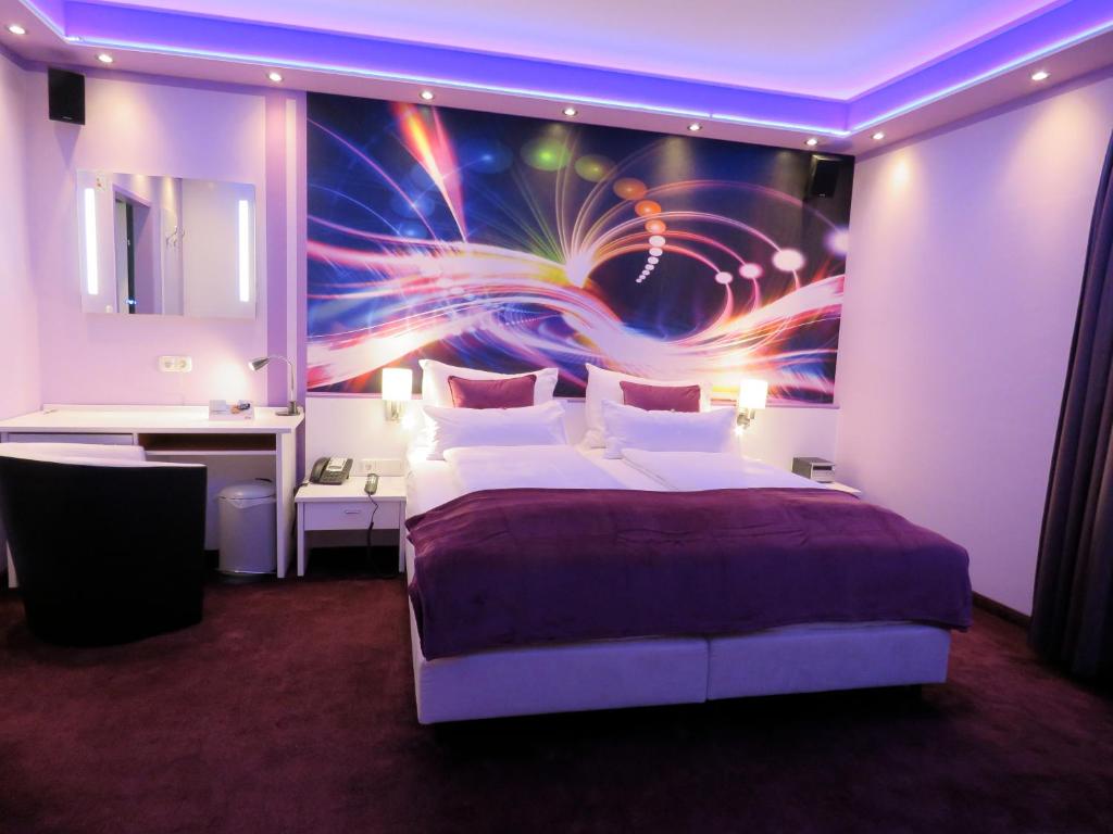 Postel nebo postele na pokoji v ubytování Hotel Residenz Hössinger