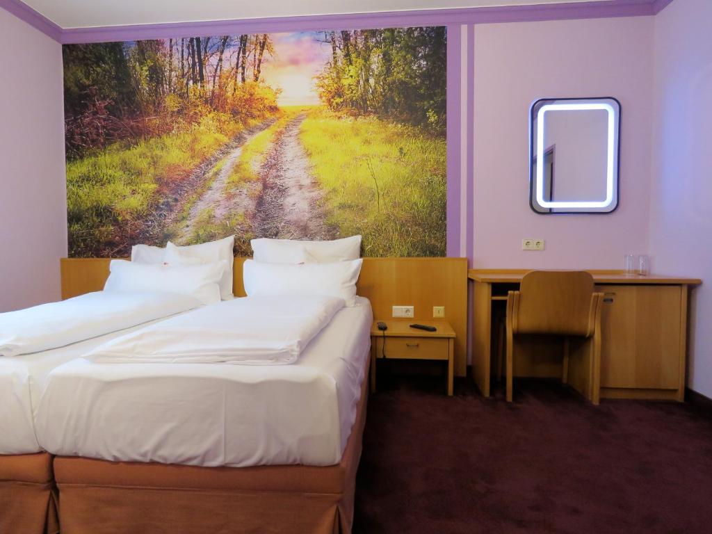 Postel nebo postele na pokoji v ubytování Hotel Residenz Hössinger