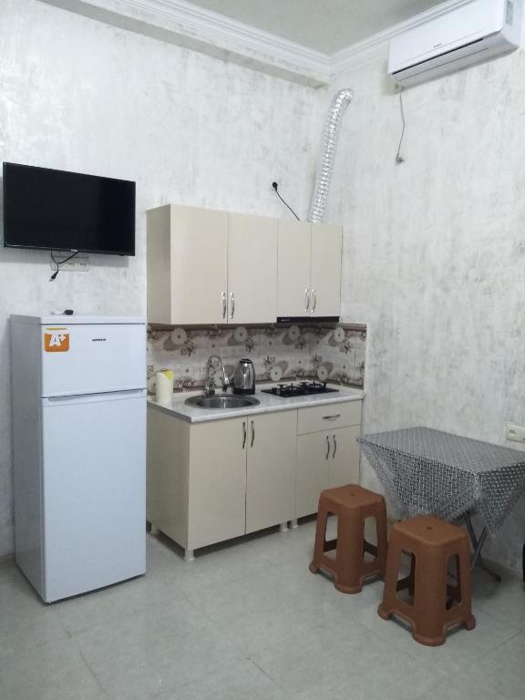 Kuchyň nebo kuchyňský kout v ubytování Hotell Anna Ureki