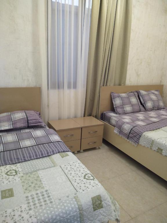Postel nebo postele na pokoji v ubytování Hotell Anna Ureki