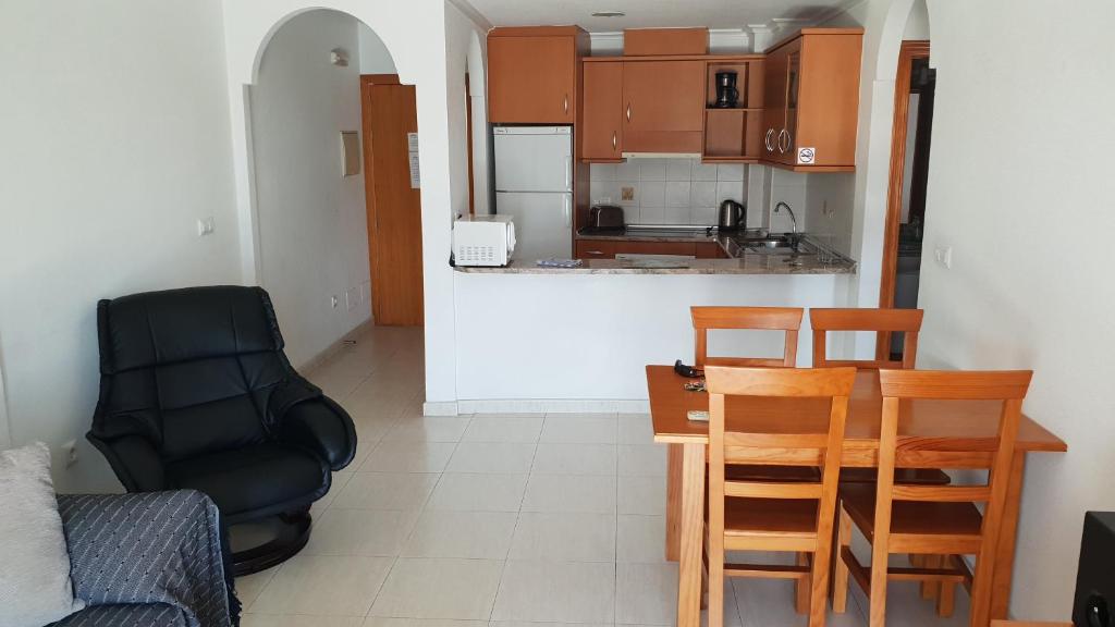 Kuchyň nebo kuchyňský kout v ubytování Reception La Rotonda Aparthotel
