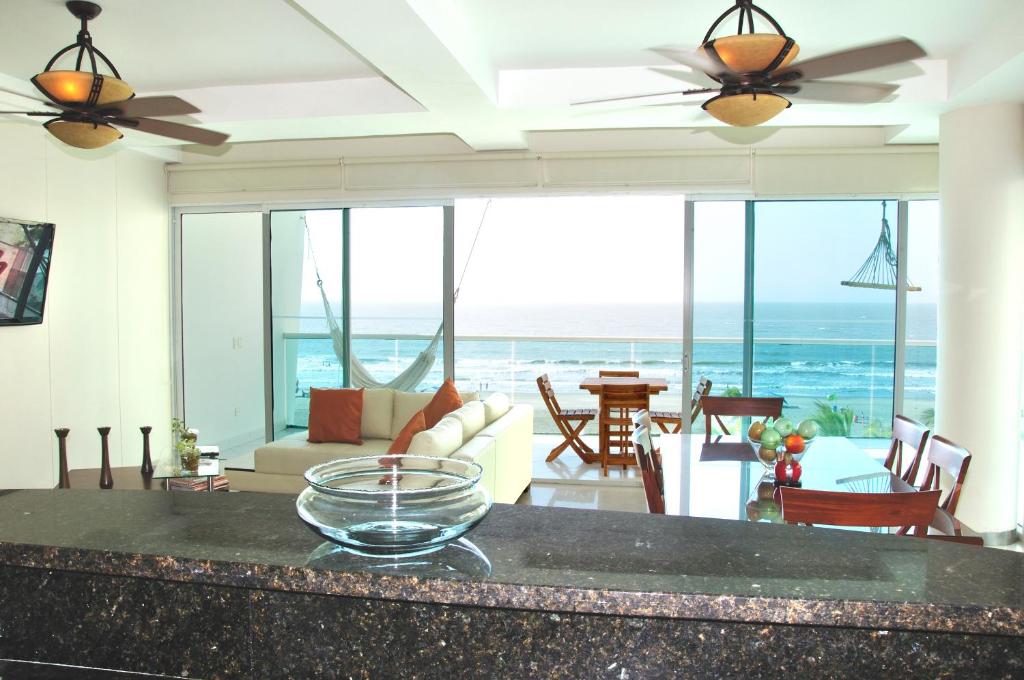 a living room with a view of the ocean at Apartamentos Morros Cartagena in Cartagena de Indias