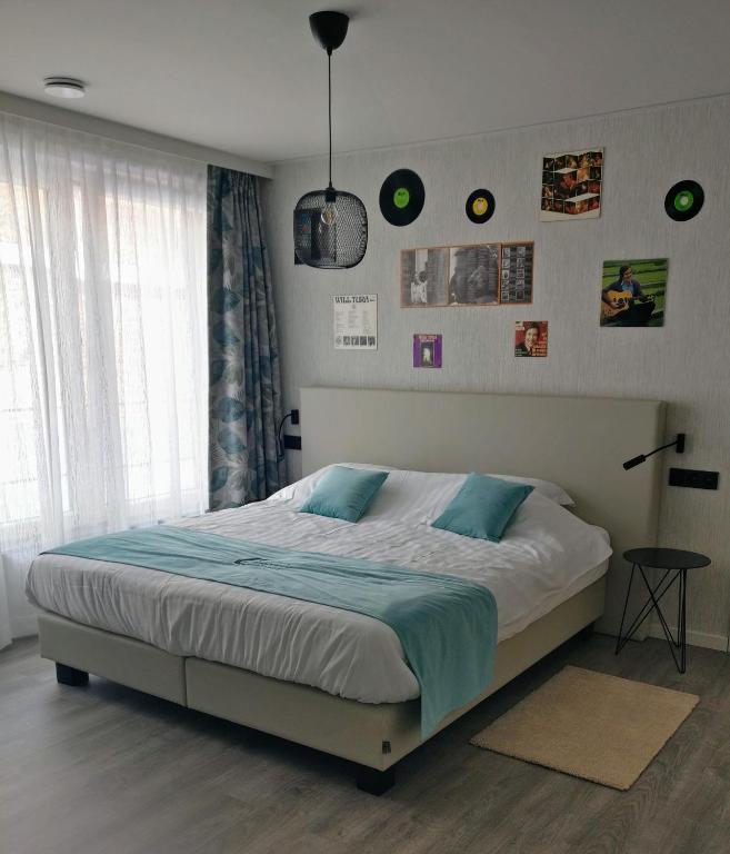 Postel nebo postele na pokoji v ubytování B & B De Veurnse Slaper