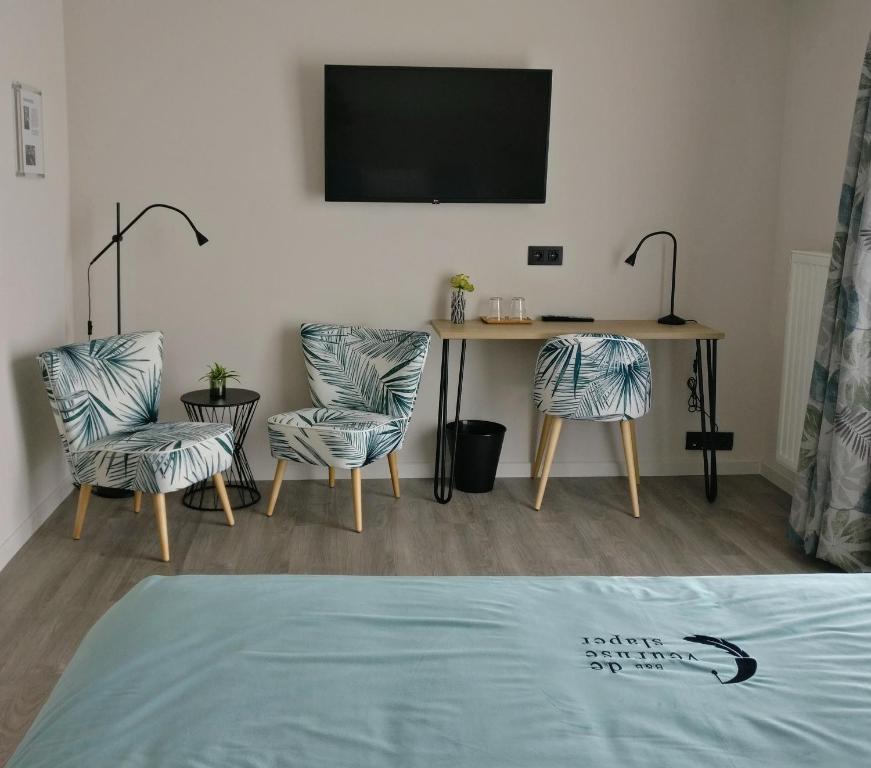 TV a/nebo společenská místnost v ubytování B & B De Veurnse Slaper
