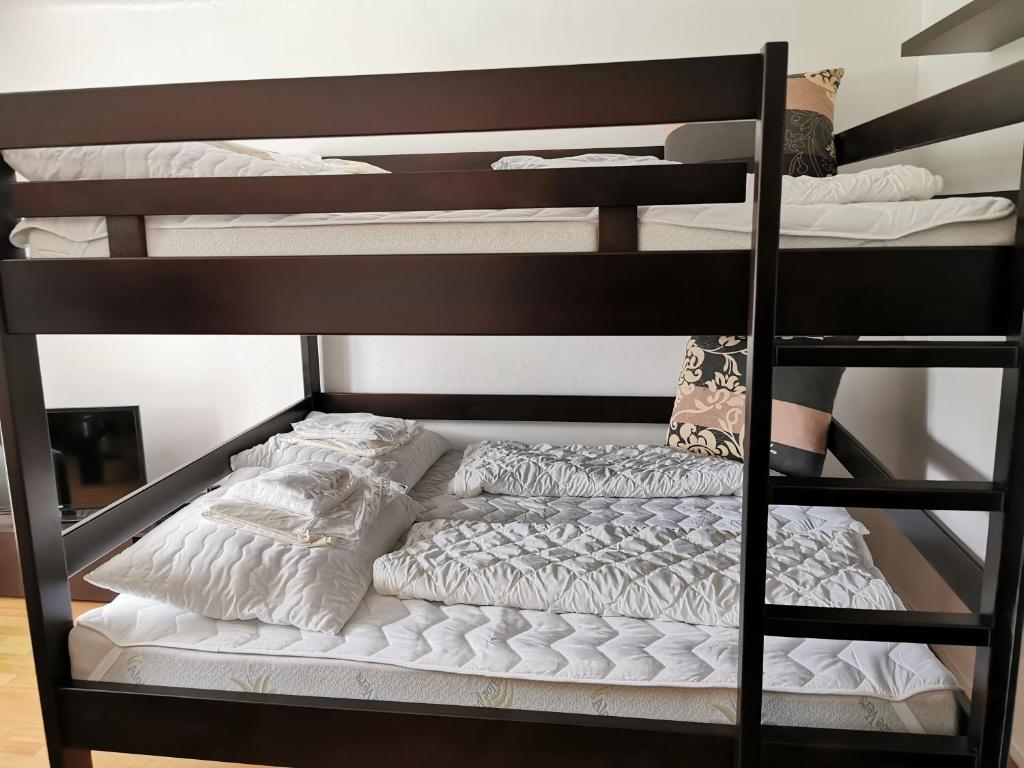 Łóżko lub łóżka w pokoju w obiekcie Apartmán Romance