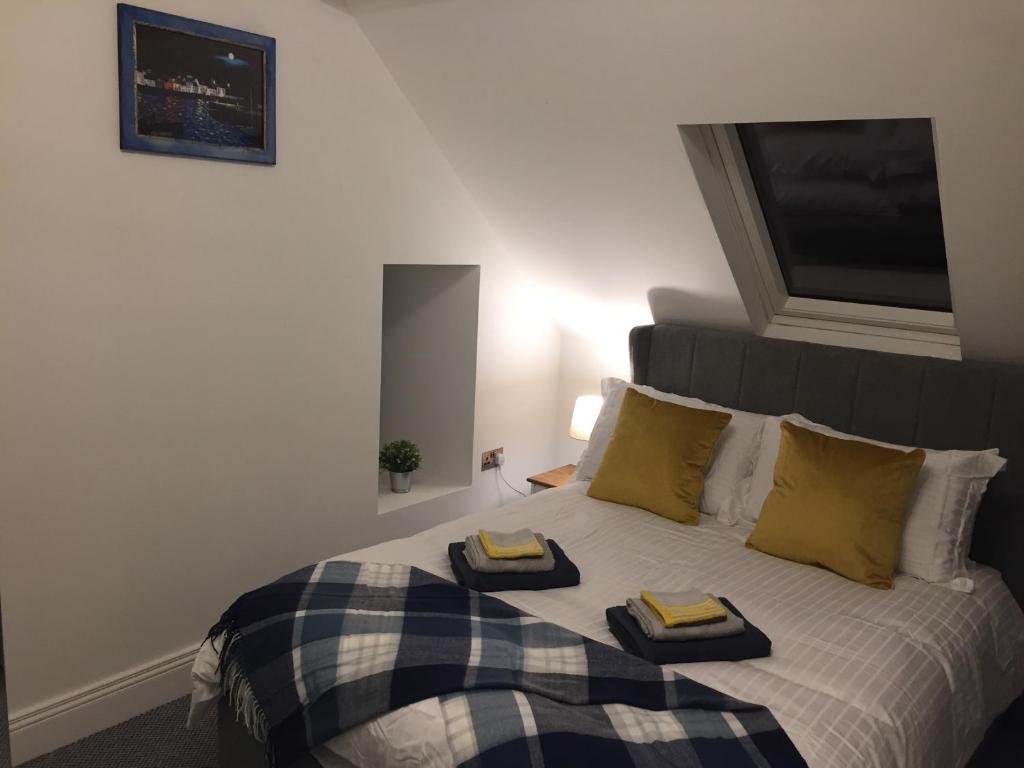 Postel nebo postele na pokoji v ubytování Lisheen Lodge
