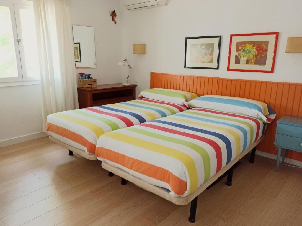 Postel nebo postele na pokoji v ubytování Casa Sanabria habitaciones privadas en una vivienda particular