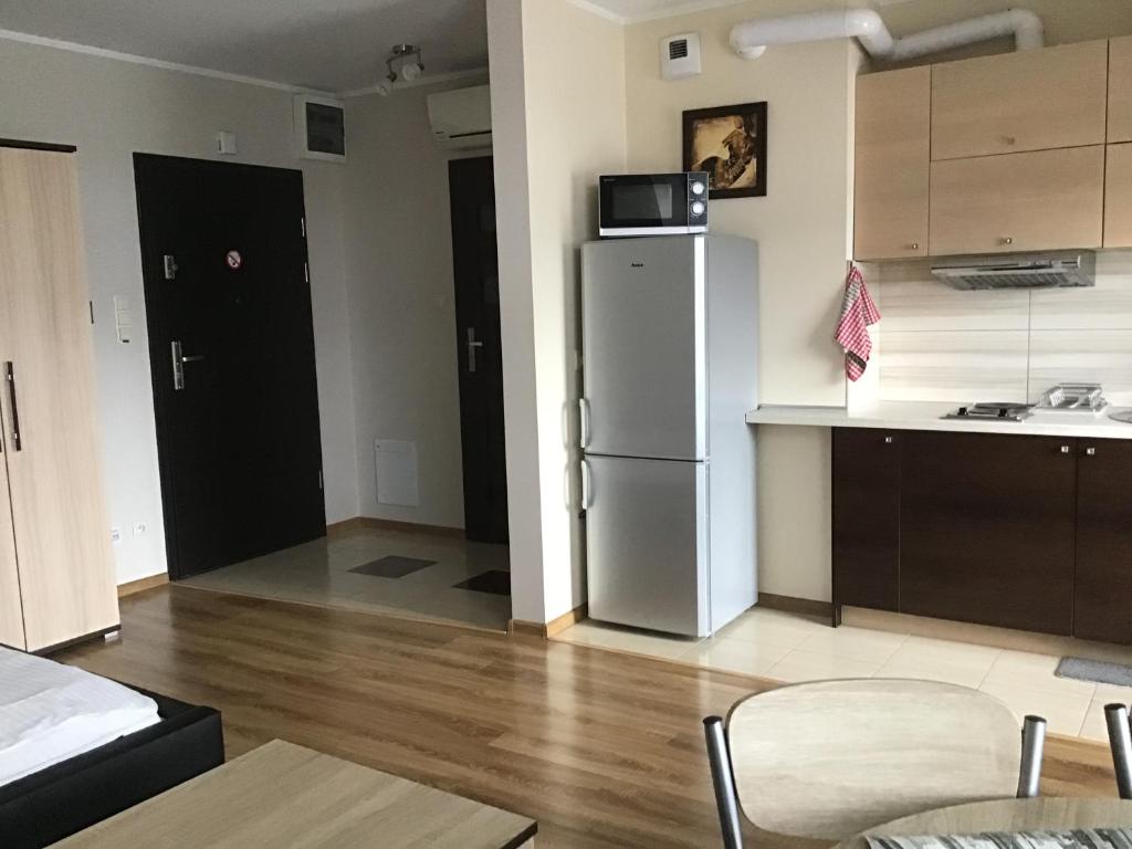 Kuchyňa alebo kuchynka v ubytovaní Młynowa - Apartamenty Centrum New